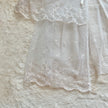 1980's ivory eyelet bed jacket