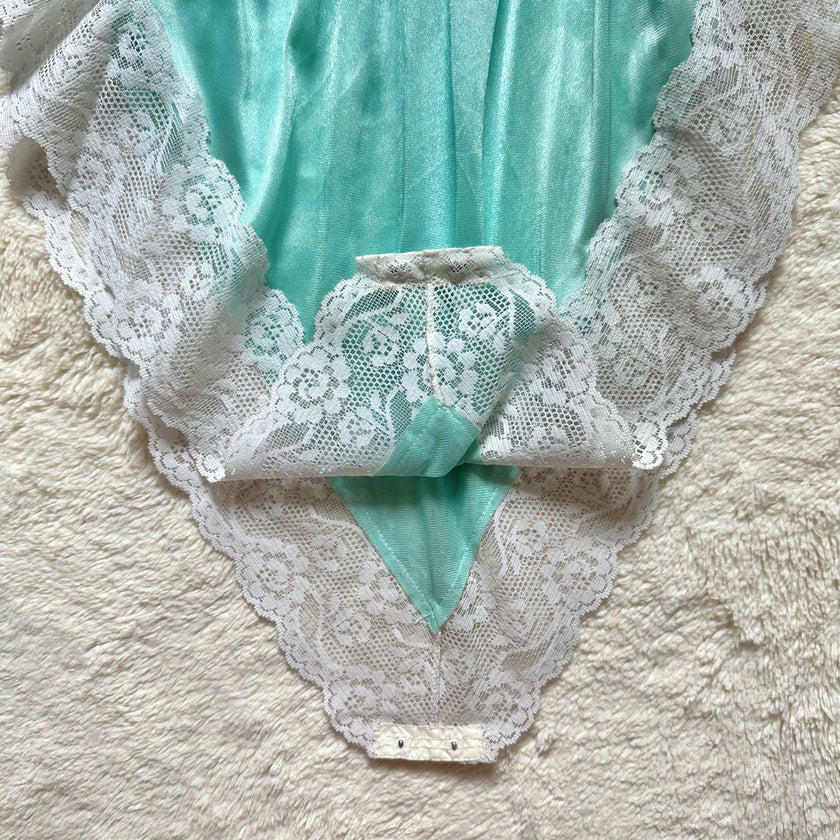 1980's aqua ruffle teddy
