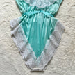 1980's aqua ruffle teddy