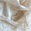 2000's ivory whisper teddy bodysuit
